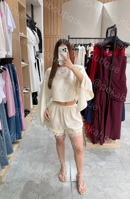 Blusa Slant Cream